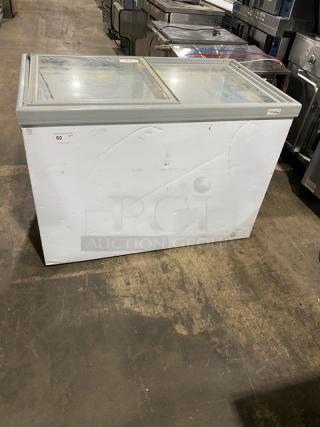 Electrolux KCG150LW0 commercial display freezer, white, double glass sliding-top, poly-coated wire rack, 115V, model visible.