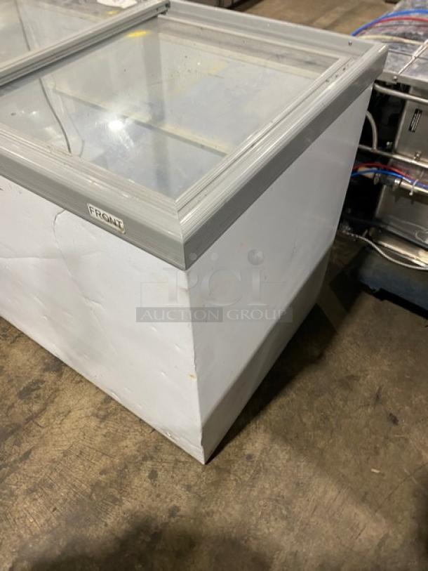 Electrolux KCG150LW0 white display freezer with double glass sliding top and poly-coated wire rack, 115V, serial WB04142710.