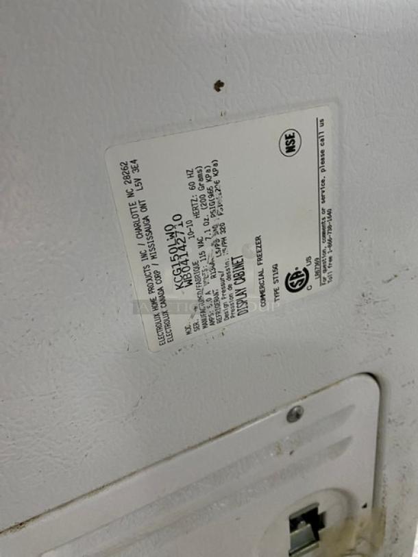 Electrolux Commercial Model KCG150LW0 display freezer label, showing specifications and serial number WB04142710.