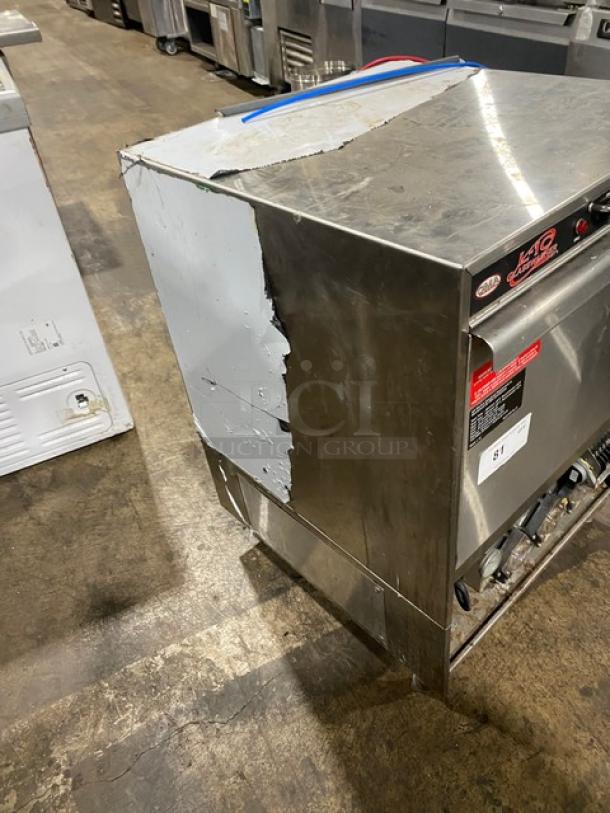 CMA Energy-Mizer L1C glasswasher, stainless steel, low-temp, electric, with peg rack, visible wear, 115V, 1 phase, on legs.
