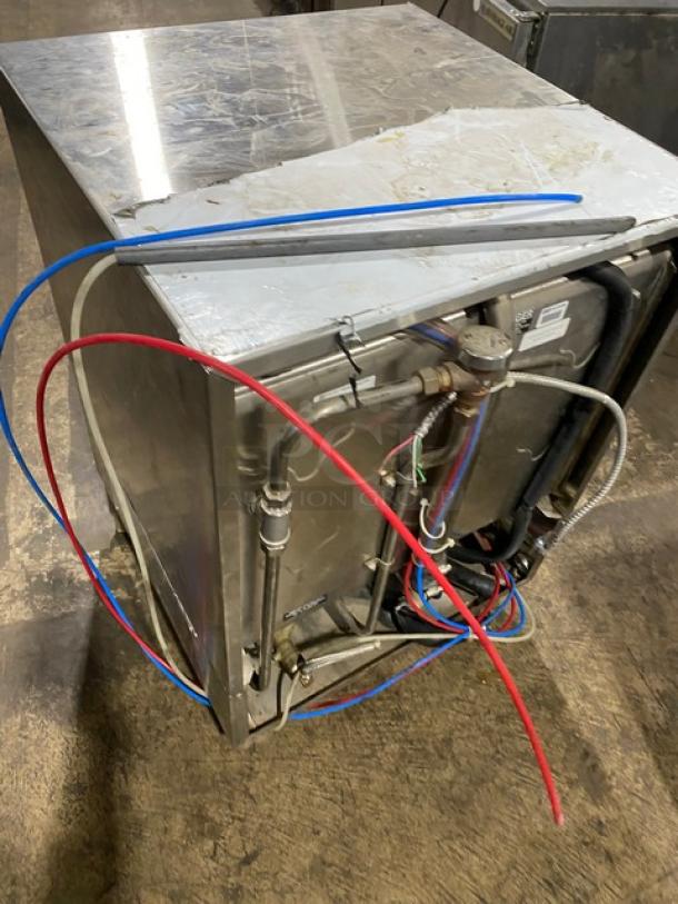 CMA Model L1C stainless steel glasswasher, electric-powered, low-temp, on legs, visible wiring and hoses, used condition.