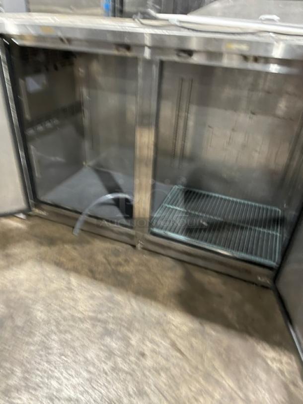 Avantco Commercial Stainless Steel 2-Door Kegerator, model 178UDD60HCS, with double tower/tap cut-outs and drip tray.
