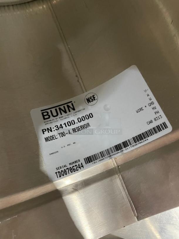 Bunn Commercial 4 Gal. Iced Tea Dispenser, Stainless Steel, Model TD-04. Features handles, visible label with serial number TD0706244.