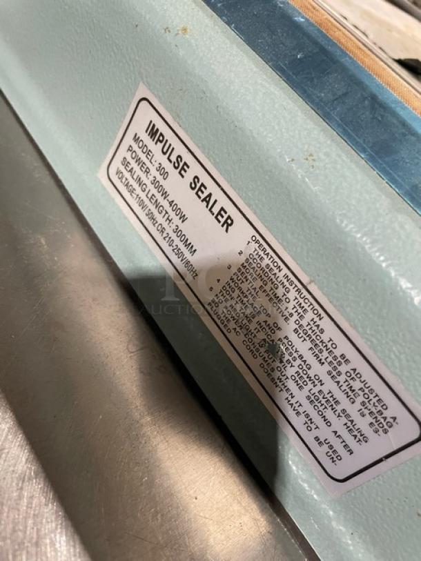 Commercial Electric Impulse Sealer, Model 300, 110V/210-250V, 400W, sealing length 300mm. In good condition with instructions label.