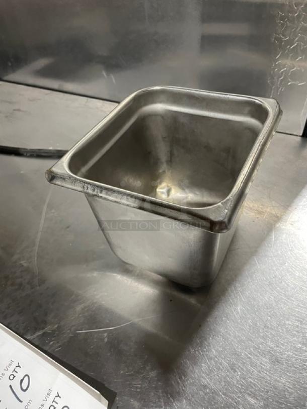 Commercial stainless steel steamtable pan, robust design, visible wear, ideal for restaurant use, 10x lot auction feature.