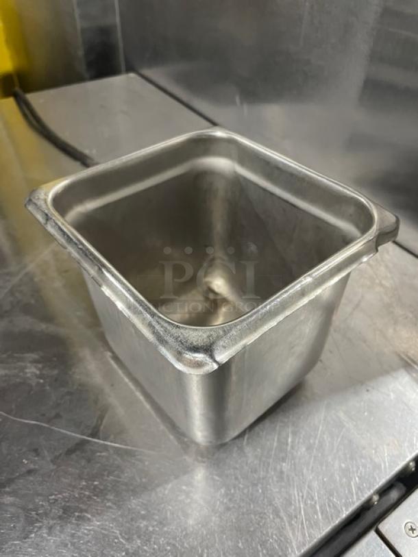 Commercial stainless steel hotel/steamtable pan, durable, slightly used, with reinforced corners, ideal for catering needs.