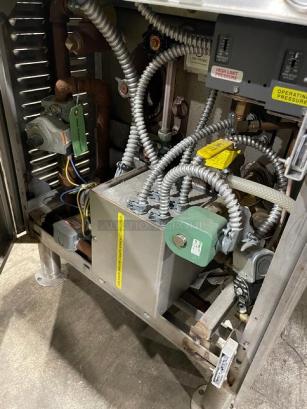 Cleveland Range Model 24CGM200 stainless steel dual-compartment convection steamer, natural gas, on legs, interior view.