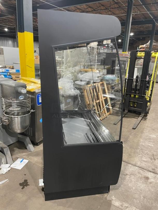 Federal Industries black multi-tier refrigerated open display case, Model RSSM478SC-5, in used condition.