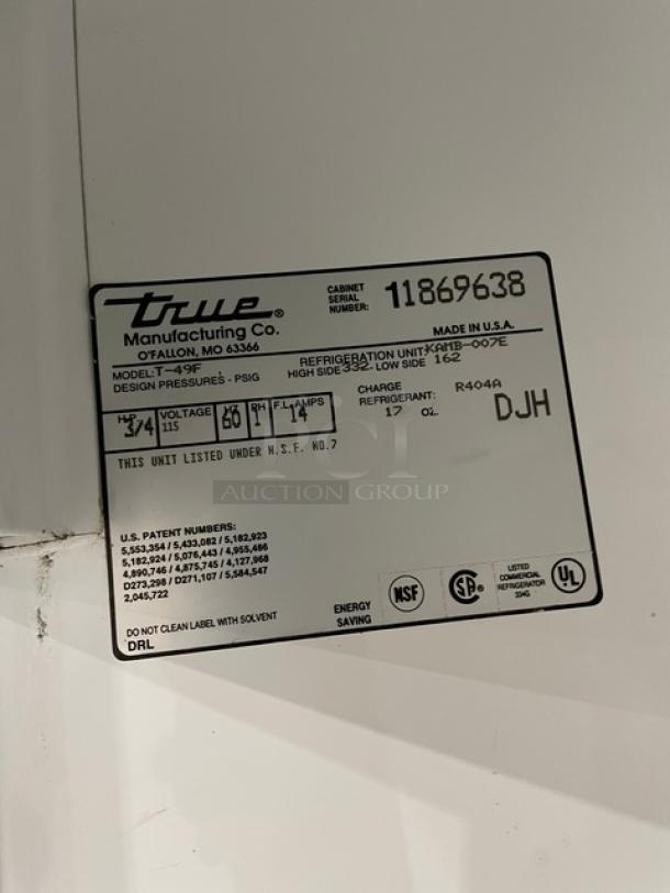 True Commercial Stainless Steel 2-Door Reach-In Freezer, Model T-49F, SN: 11869638, 115V 1 Phase, on casters, poly racks.