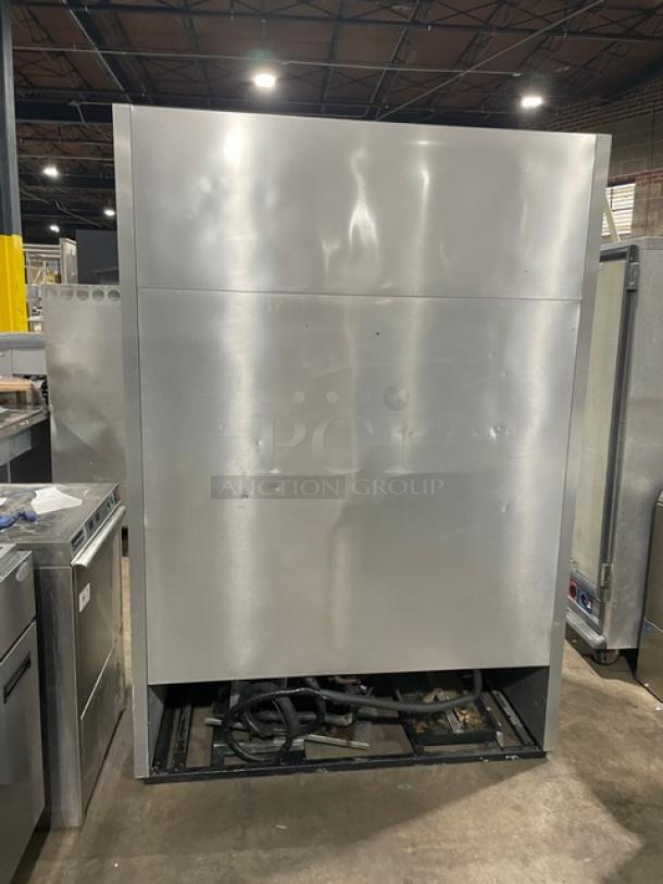 True T-49F commercial stainless steel 2-door reach-in freezer, with poly-coated wired rack, 115V, SN: 12124637.