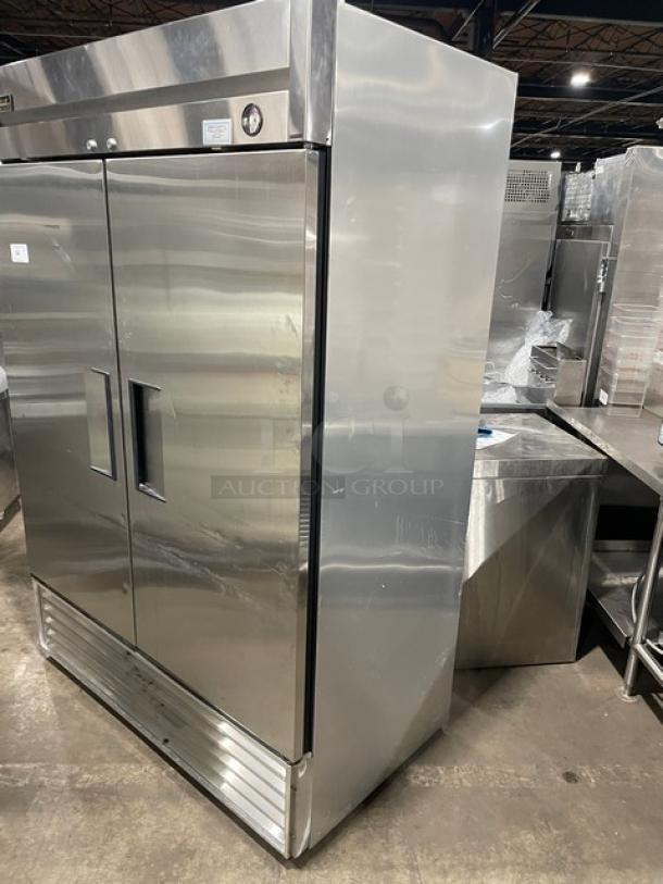 True Commercial Stainless Steel 2 Door Reach-In Freezer, Model T-49F, with poly-coated wire rack, Excellent Condition.