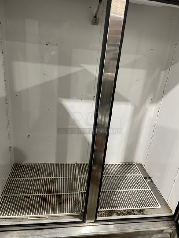 True Commercial Stainless Steel 2 Door Reach-In Freezer, Model T-49F, SN: 12124637, with poly-coated wired rack, 115V, 1 Phase.