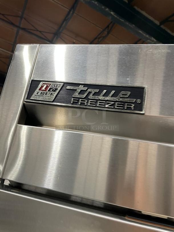 True Commercial Stainless Steel 2-Door Reach-In Freezer, Model T-49F, features logo plate, 115V, 1 Phase, poly-coated rack.