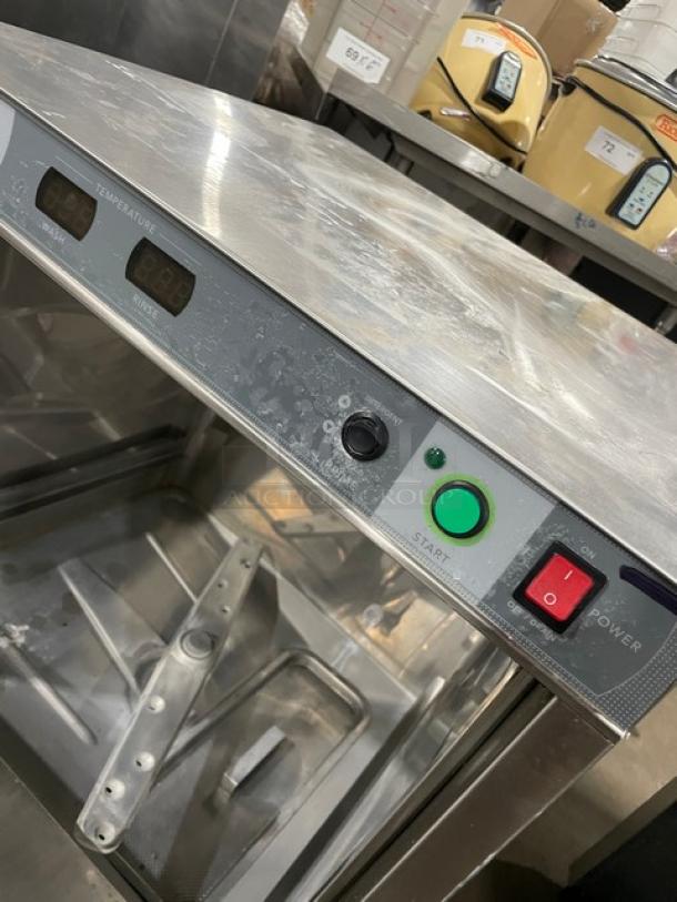 Champion UH130B-70M4 stainless steel undercounter high-temp dishwasher, electric powered, 120-208/230V, used condition.