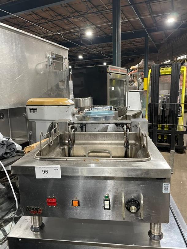 APW Wyott stainless steel countertop deep fat fryer, electric powered, thermostatic control, mounted on legs, used condition.