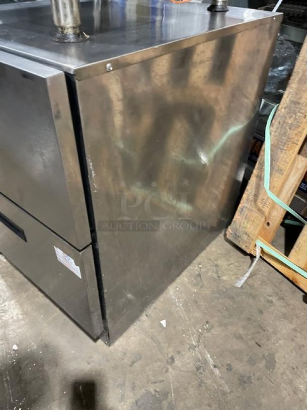 Delfield stainless steel 2-drawer undercounter refrigerator, model UCD4427N-STAR, 115V. Minor surface wear visible.