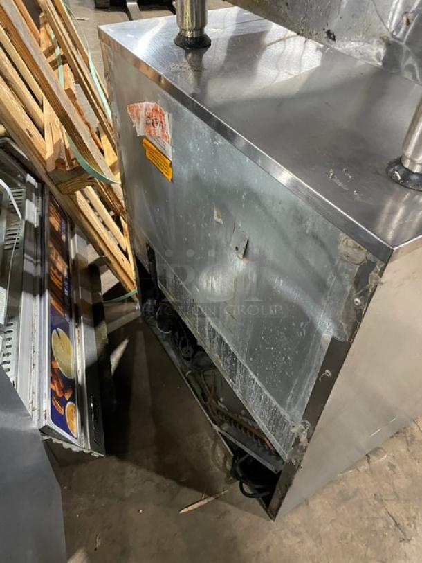 Delfield UCD4427N-STAR stainless steel 2-drawer undercounter refrigerator, 115V, visible wear on surface, commercial-grade.