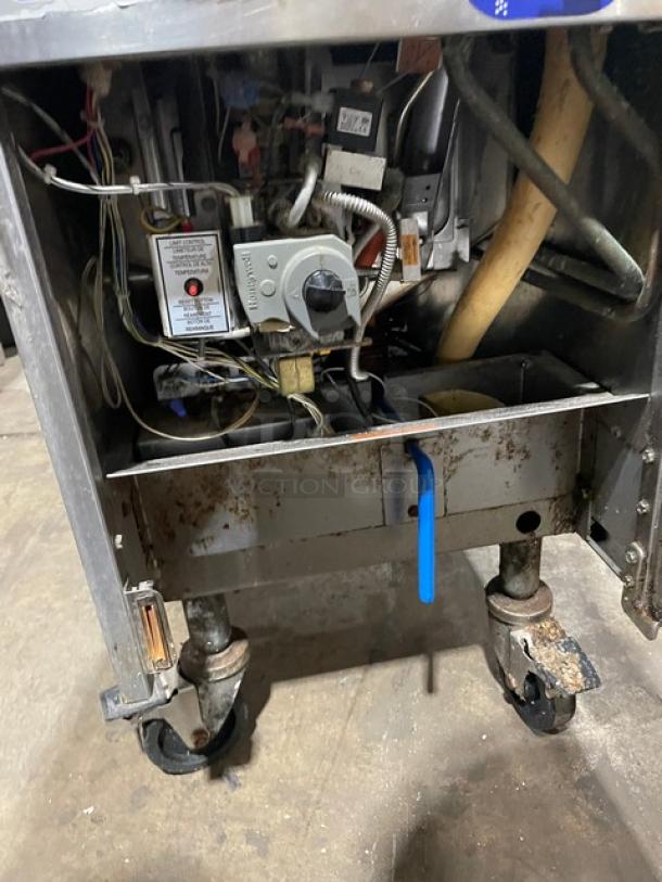 Pitco Solstice Supreme Series SSPG14 commercial pasta cooker, natural gas, digital controls, on casters, internal view showing wiring and components.