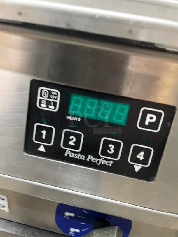 Pitco Solstice Supreme SSPG14 pasta cooker with digital touch controls, stainless steel, natural gas, 12 gal, on casters.