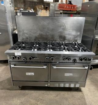 U.S. Range commercial stainless steel 10 burner range with double oven, backsplash, and wired rack. Good condition.
