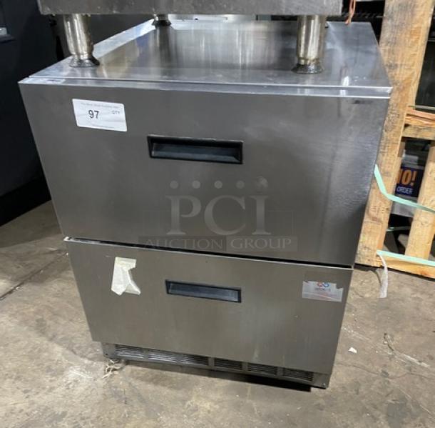 Delfield stainless steel undercounter refrigerator, model UCD4427NSTAR. Features two drawers, 115V, commercial grade, visible label.