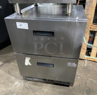 Delfield stainless steel undercounter refrigerator, model UCD4427NSTAR. Features two drawers, 115V, commercial grade, visible label.