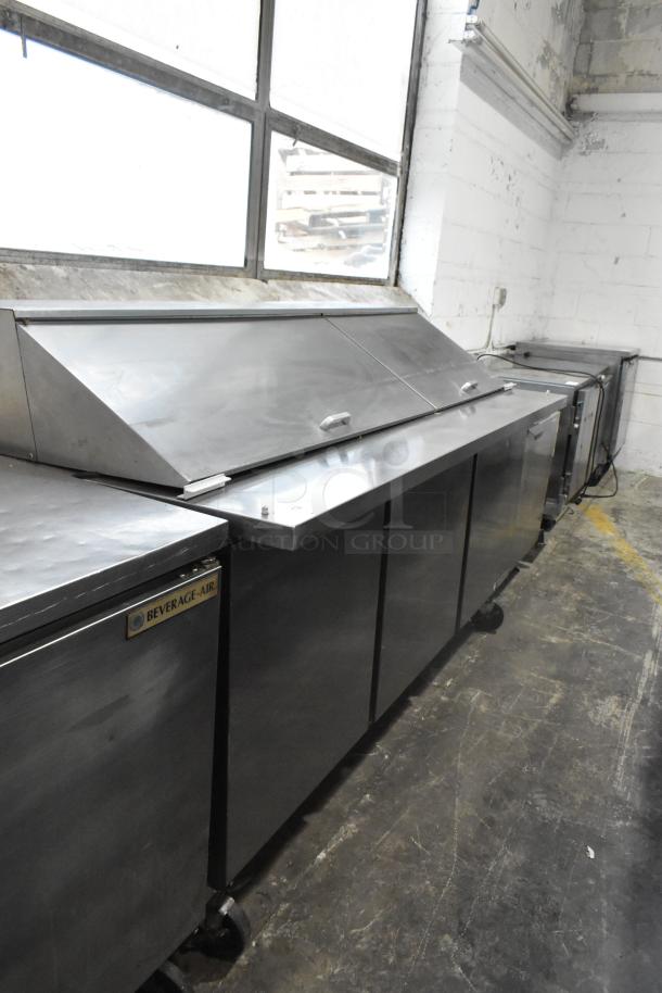 Beverage Air SPE72-30M stainless steel prep table, commercial casters, intact condition, 115V, 1 Phase, label visible.