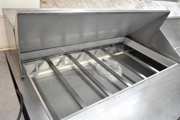 Beverage Air SPE72-30M stainless steel prep table with open top compartment, commercial casters, 115V, 1 phase.