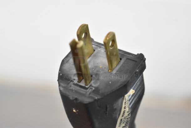 Plug close-up of Beverage Air SPE72-30M commercial prep table. Item shows part of the power connection, 115 volts, 1 phase.