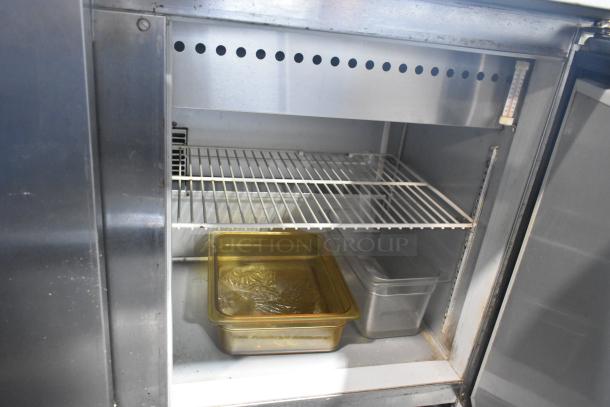 Beverage Air SPE72-30M stainless steel prep table, features interior shelving, Bain Marie pans, and commercial casters, 115V.