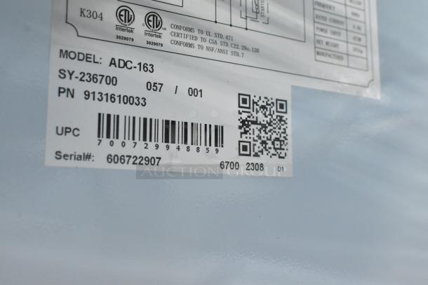Label on 2023 Falcon ADC-163 Deli Display Case showing model, serial number, and electrical specifications.