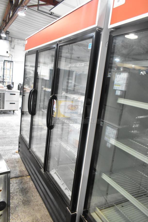 Master-Bilt MBGRP74-HG 3-door reach-in cooler, metal finish, poly coated racks, excellent condition, 115/208-240V, 1-phase.
