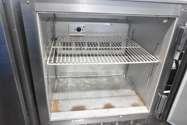 Beverage Air UCR27A stainless steel undercounter cooler, single door, commercial casters, 115V, 1 phase, some interior wear.
