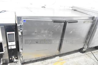 Beverage Air UCR48A stainless steel commercial 2-door undercounter cooler on casters, 115V, 1 phase, minor surface wear.