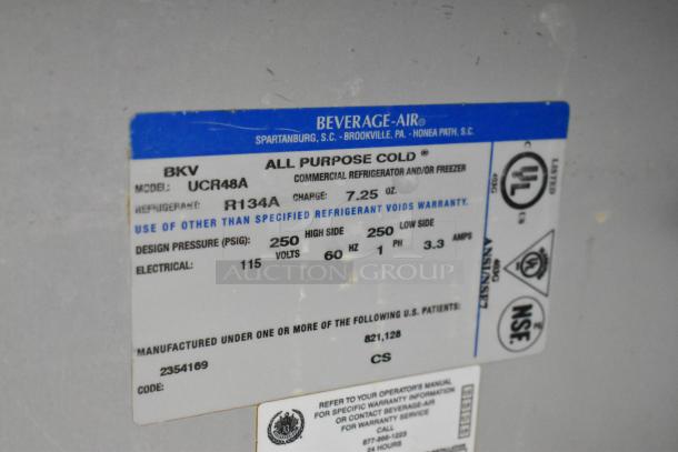 Beverage Air UCR48A stainless steel commercial cooler label; shows model, refrigerant info, 115V, 1 phase.