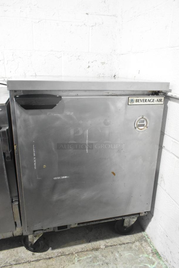 Beverage Air WTF27AHC-028 stainless steel undercounter freezer, single door, on casters, 115 volts, commercial use, visible wear.