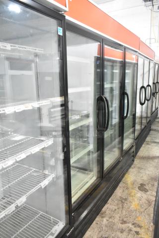 Master-Bilt MBGRP74-HG 3-door commercial reach-in cooler with poly-coated racks, shown in good condition.