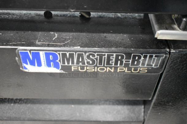 Master-Bilt MBGRP74-HG label on black surface; indicates reach-in cooler model with Fusion Plus branding.