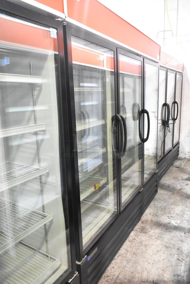 Master-Bilt MBGRP74-HG 3-door reach-in cooler with glass doors and poly-coated racks for commercial use.