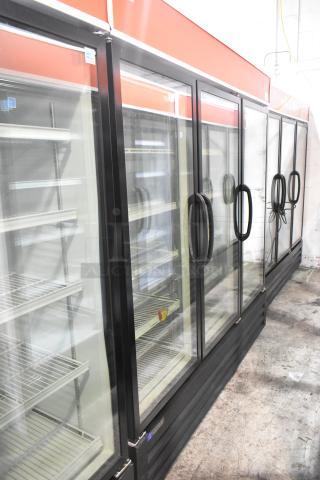 Master-Bilt MBGRP74-HG 3-door reach-in cooler with glass doors and poly-coated racks for commercial use.