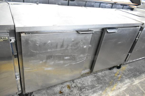 Beverage Air stainless steel 3-door undercounter cooler with commercial casters. Operates on 115 volts, 1 phase. Good condition.