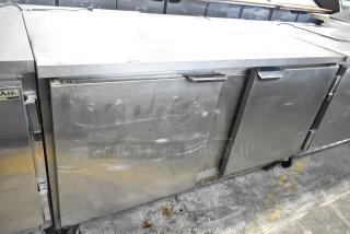 Beverage Air stainless steel 3-door undercounter cooler with commercial casters. Operates on 115 volts, 1 phase. Good condition.