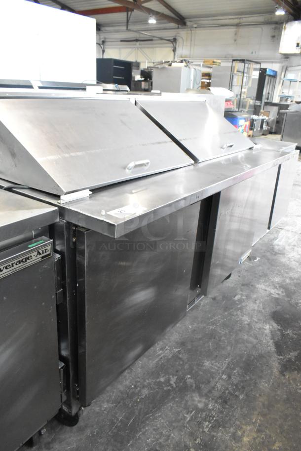 Beverage Air SPE60-24M stainless steel commercial sandwich prep table, 115V, on commercial casters, used condition.