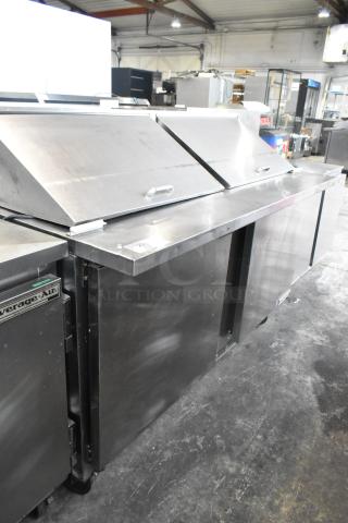 Beverage Air SPE60-24M stainless steel commercial sandwich prep table, 115V, on commercial casters, used condition.