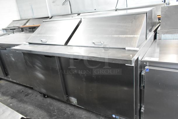 Beverage Air SPE60-24M stainless steel prep table with dual lids, on casters. 115V, 1 phase. Ideal for sandwich/salad prep.