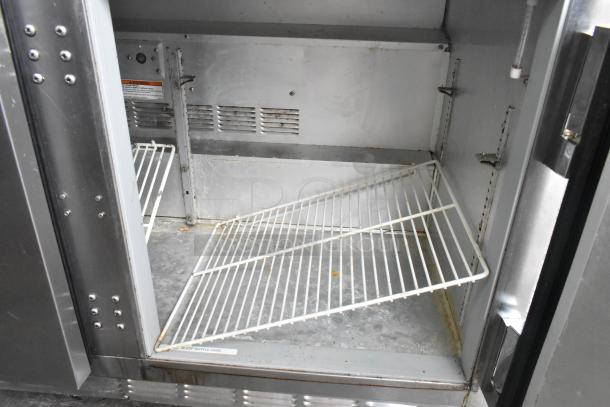 Beverage Air UCR48A stainless steel undercounter cooler, two doors, on commercial casters, interior shelves shown, 115 volts, 1 phase.