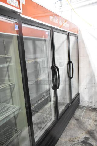 Master-Bilt MBGRP74-HG 3-door cooler, metal, poly-coated racks, 115/208-240V. "Milk & dairy" signage.