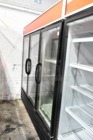 Master-Bilt MBGRP74-HG metal commercial 3-door reach-in cooler with poly-coated racks, 115/208-240 Volts, 1 Phase.