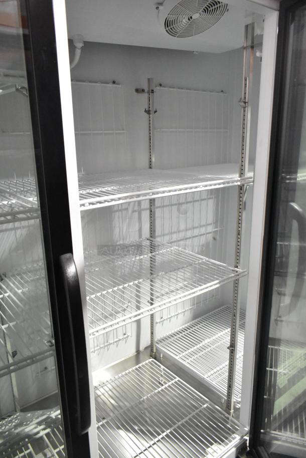 Master-Bilt MBGRP74-HG commercial cooler, 3-door, metal, poly-coated racks, 115/208-240V, excellent condition.
