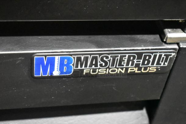 Master-Bilt MBGRP74-HG logo on black surface, indicating Fusion Plus series for commercial reach-in cooler merchandiser.